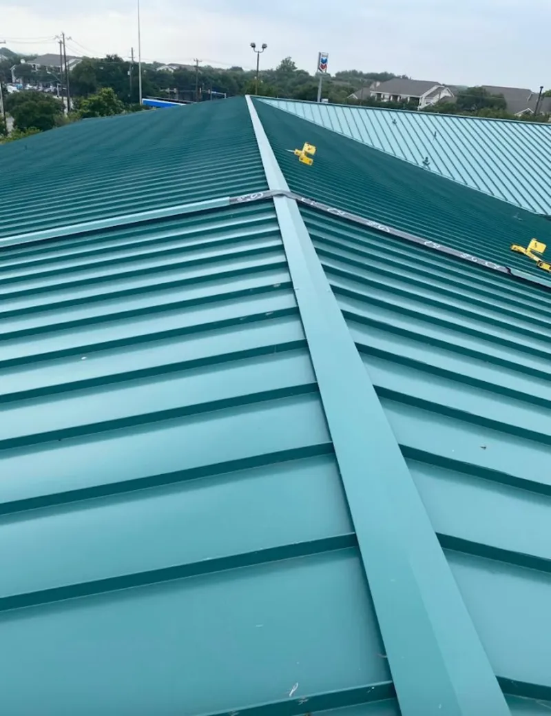 Green commercial metal roof ridge and valley for Metal Roof Repair in Penitas